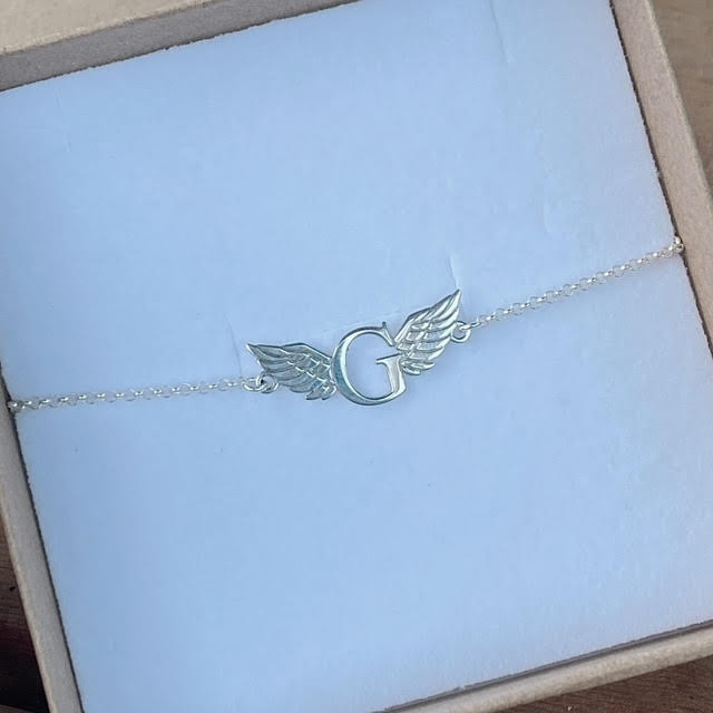  צמיד אות וכנפיים