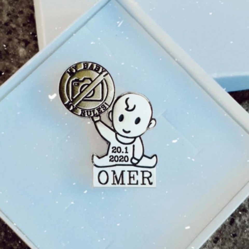 סיכה לעגלת תינוק סלפי